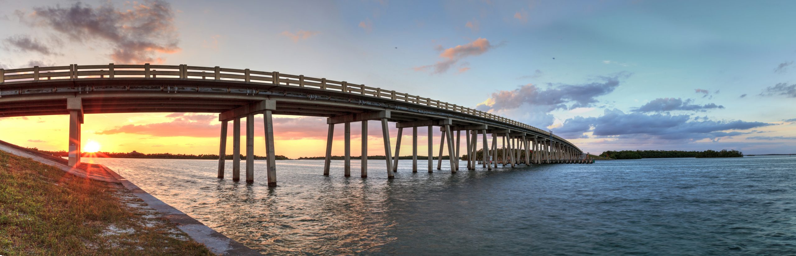 Sunset over Bridge along Estero Boulevard, crossing over New Pass from Estero Bay in Bonita Springs